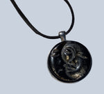 Carved Obsidian Pendants