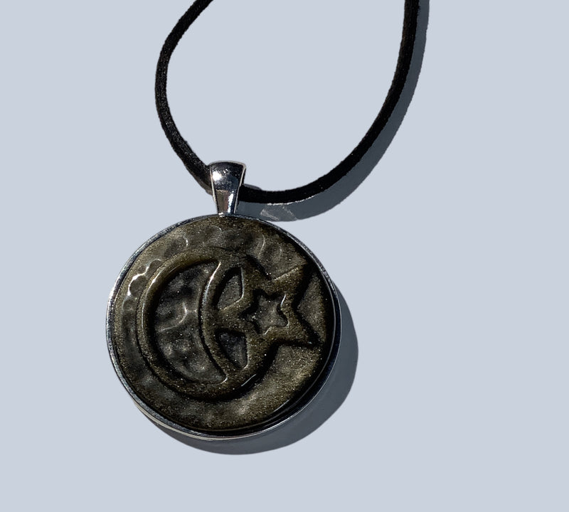 Carved Obsidian Pendants