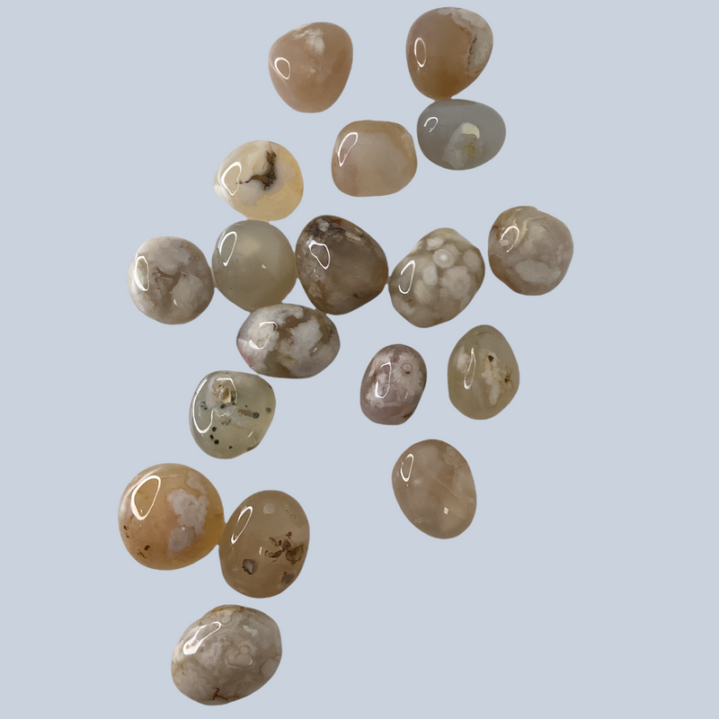 flower agate tumbles. Metaphysical and spiritual crystal gem stones rooted in Melbourne, Florida – Each product carries the natural essence of Brevard County’s sun, sea, sand, and soil. Essential Elements Wellness 