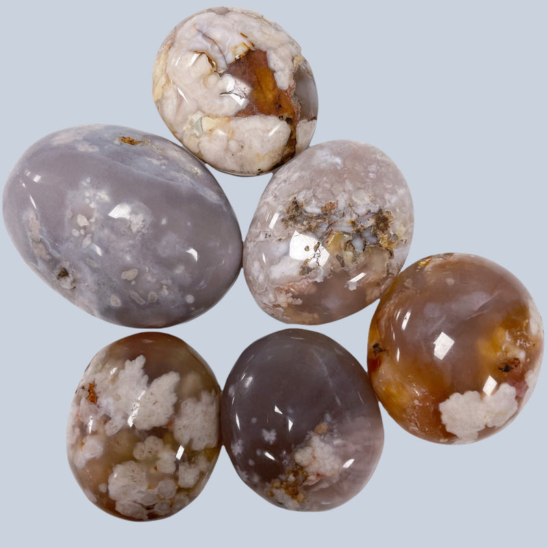 Flower Agate Palm .Metaphysical and spiritual crystal gem stones rooted in Melbourne, Florida – Each product carries the natural essence of Brevard County’s sun, sea, sand, and soil. Essential Elements Wellness 