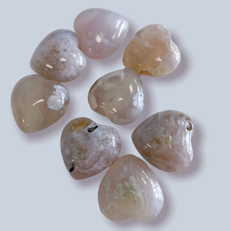 Flower agate heart. Metaphysical and spiritual crystal gem stones rooted in Melbourne, Florida – Each product carries the natural essence of Brevard County’s sun, sea, sand, and soil. Essential Elements Wellness 